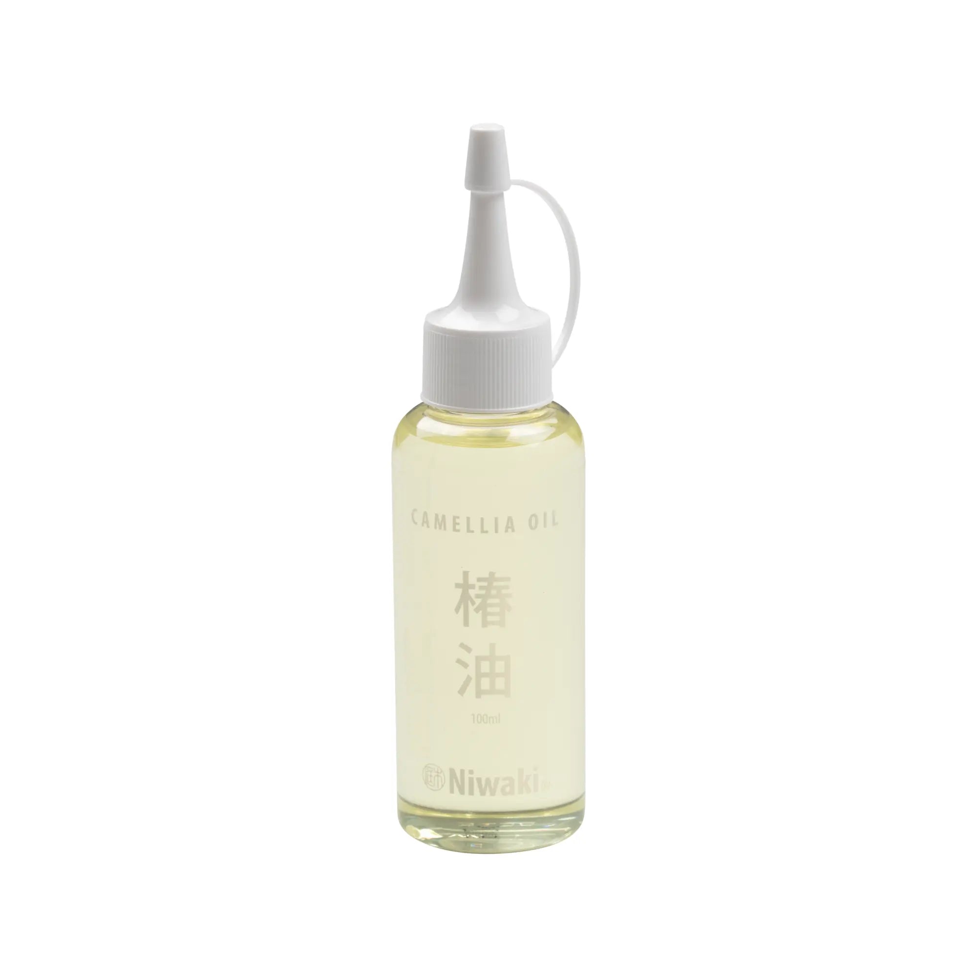 Bottle of Niwaki Camellia Oil for garden tool maintenance on a white background