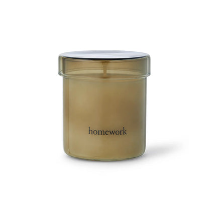 Smokey glass jar containing Homework Candle with &